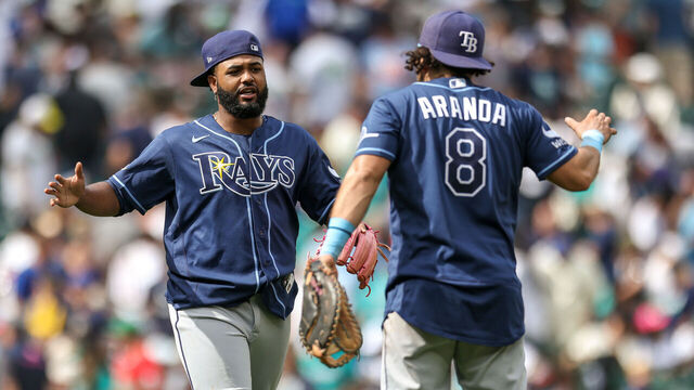 SEATTLE, WASHINGTON - AUGUST 09: Junior Caminero #13 of the Tampa Bay Rays celebrates with Jonathan Aranda #8 after the game against the Seattle Mariners at T-Mobile Park on August 09, 2026 in Seattle, Washington.