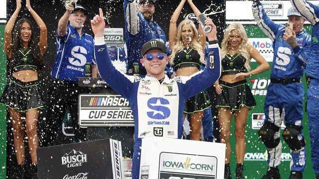 NEWTON, IOWA - AUGUST 09: Ty Gibbs, driver of the #54 SiriusXM Toyota, celebrates in victory lane after winning the NASCAR Cup Series Iowa Corn 350 Powered by Ethanol at Iowa Speedway on August 09, 2026 in Newton, Iowa.