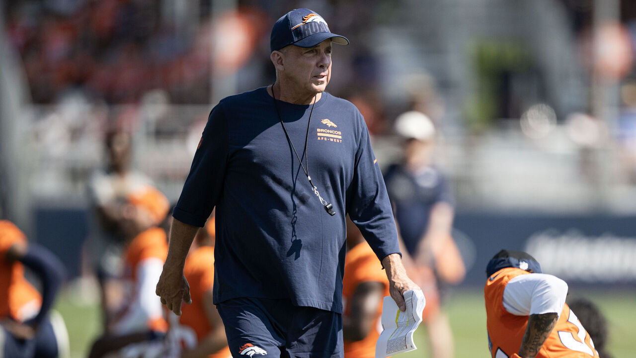 CENTENNIAL , CO - AUGUST 6: Head coach Sean Payton of the Denver Broncos walks the field while players stretch during practice on Thursday, August. 6, 2026, at Broncos Park in Centennial, Colo.