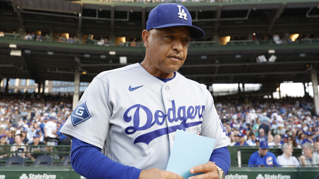 CHICAGO, ILLINOIS - AUGUST 03: Manager Dave Roberts #30 of the Los Angeles Dodgers looks on prior to the game against the Chicago Cubs at Wrigley Field on August 03, 2026 in Chicago, Illinois.
