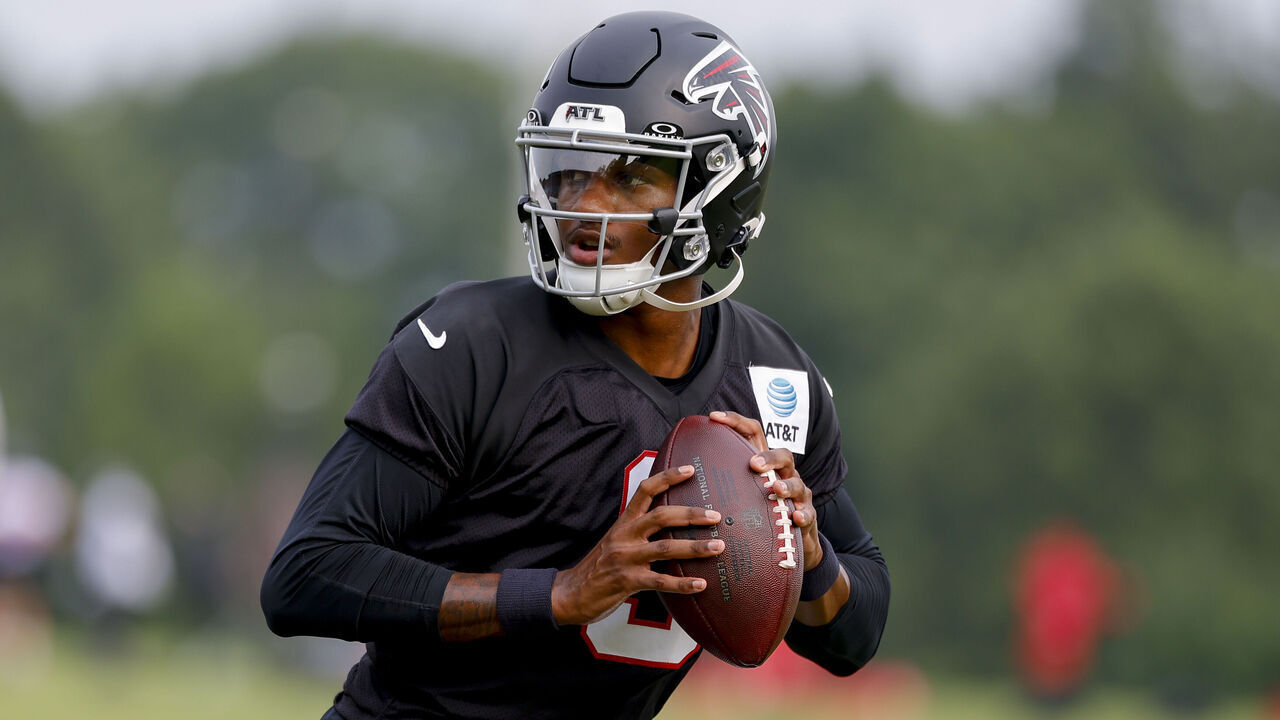FLOWERY BRANCH, GEORGIA - JULY 29: Michael Penix Jr. #9 of the Atlanta Falcons runs through drills during training camp at IBM Performance Field on July 29, 2026 in Flowery Branch, Georgia.