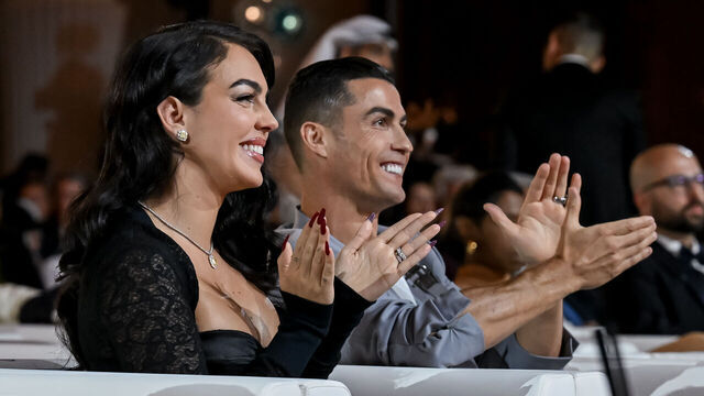 DUBAI, UNITED ARAB EMIRATES - DECEMBER 27: Al-Nassr player Cristiano Ronaldo (2nd L) and Georgina Rodriguez (L) attend the Globe Soccer Dubai Awards 2024 as part of the Dubai International Sports Conference 2024 in Dubai, United Arab Emirates (UAE) on December 27, 2024.