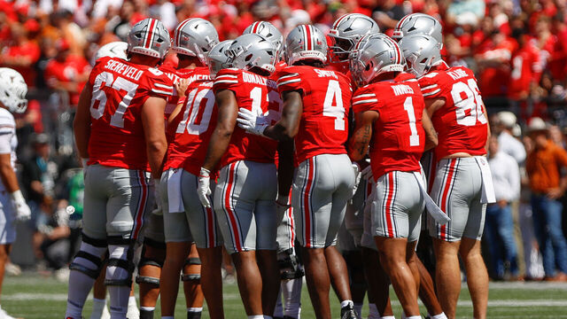 COLUMBUS, OH - AUGUST 30: The Ohio State Buckeyes offense huddles during the game against the Texas Longhorns and the Ohio State Buckeyes on August 30, 2025, at Ohio Stadium in Columbus, OH.
