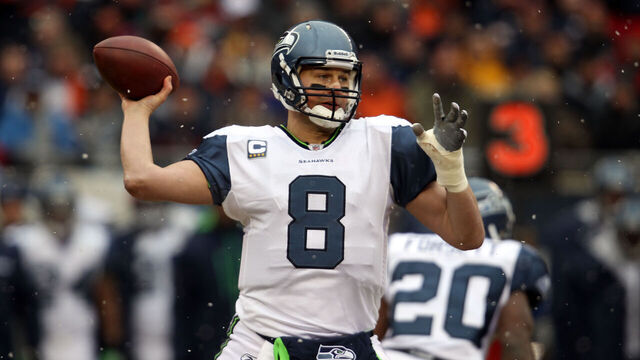 CHICAGO, IL - JANUARY 16: Quarterback Matt Hasselbeck #8 of the Seattle Seahawks throws the ball in the first quarter against the Chicago Bears in the 2011 NFC divisional playoff game at Soldier Field on January 16, 2011 in Chicago, Illinois.
