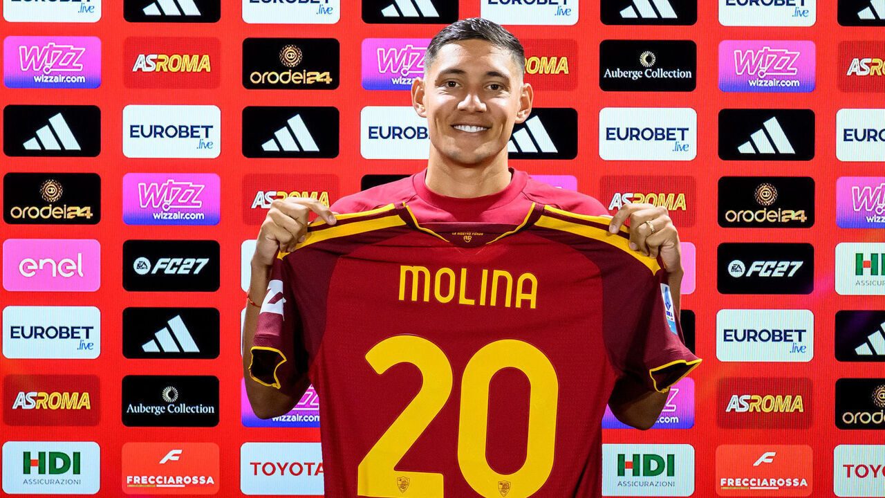 ROME, ITALY - AUGUST 12: AS Roma new signing Nahuel Molina poses with his new jersey at Centro Sportivo Fulvio Bernardini on August 12, 2026 in Rome, Italy.