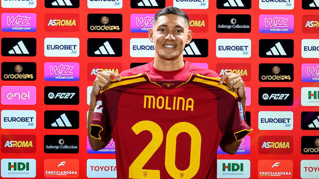 ROME, ITALY - AUGUST 12: AS Roma new signing Nahuel Molina poses with his new jersey at Centro Sportivo Fulvio Bernardini on August 12, 2026 in Rome, Italy.