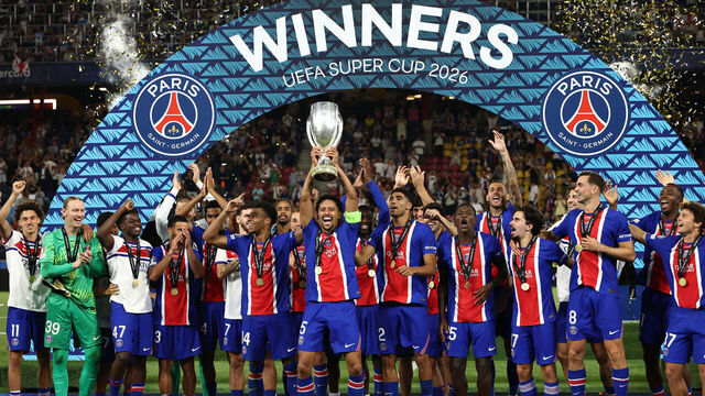 PSG players including Paris Saint-Germain's Brazilian defender #05 Marquinhos celebrate with the trophy after winning the UEFA Supercup football match between Champions League winners Paris Saint Germain (PSG) and Europa League winners Aston Villa in Salzburg, Austria on August 12, 2026.