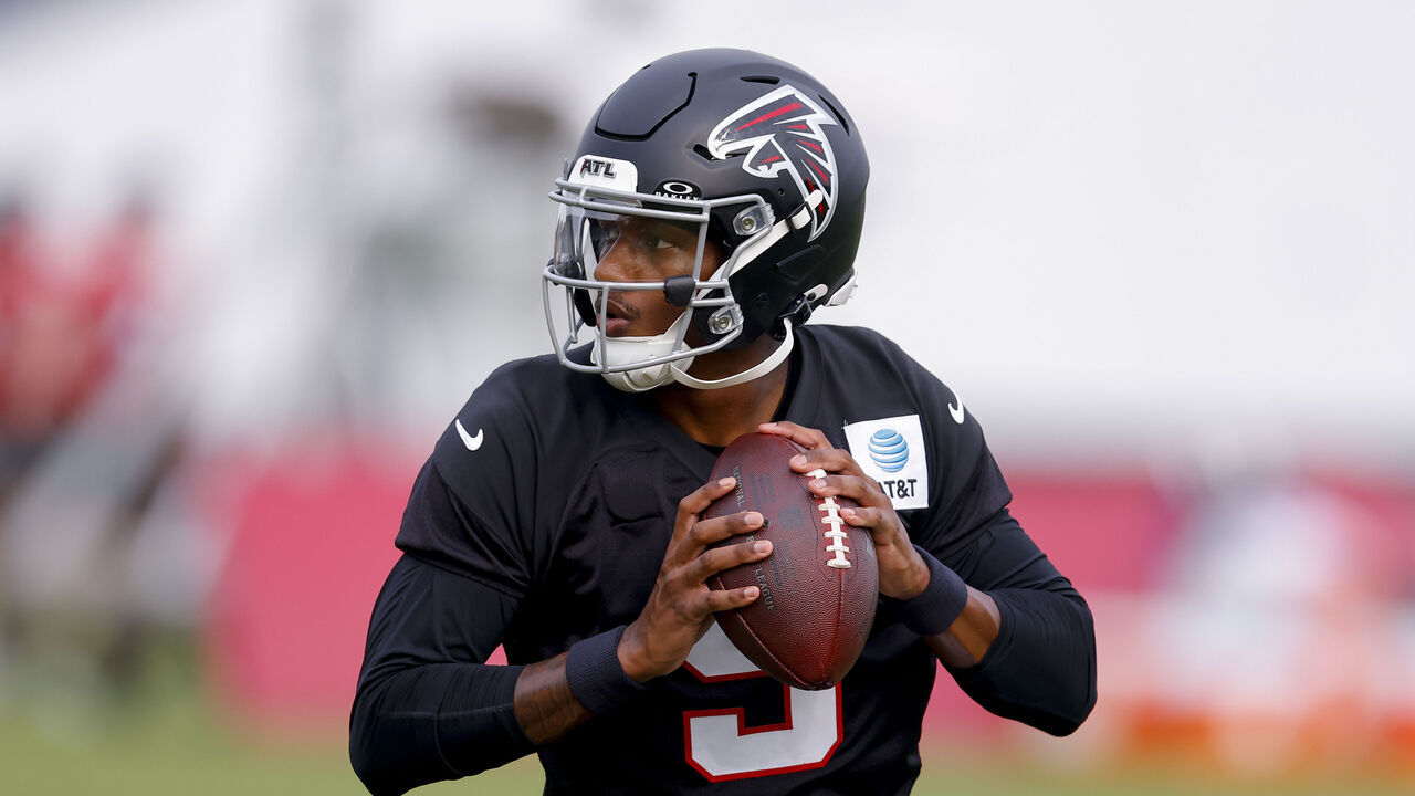 FLOWERY BRANCH, GEORGIA - JULY 29: Michael Penix Jr. #9 of the Atlanta Falcons runs through drills during training camp at IBM Performance Field on July 29, 2026 in Flowery Branch, Georgia.