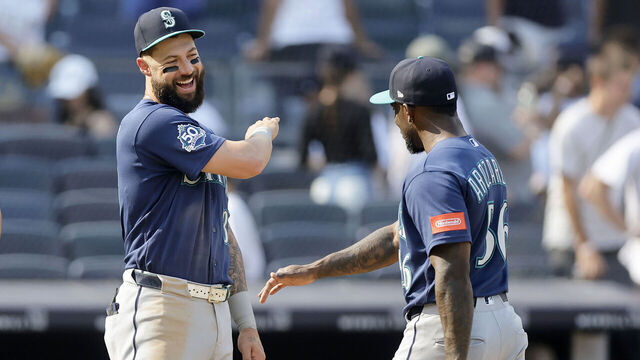 NEW YORK, NEW YORK - AUGUST 13: Weston Wilson #31 and Randy Arozarena #56 of the Seattle Mariners celebrate after defeating the New York Yankees at Yankee Stadium on August 13, 2026 in New York City.