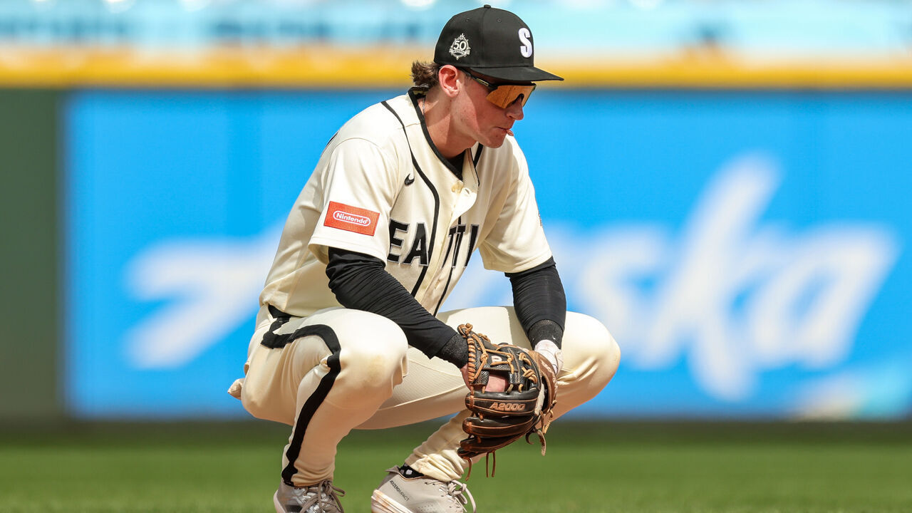 SEATTLE, WASHINGTON - AUGUST 09: Colt Emerson #4 of the Seattle Mariners looks on during the eighth inning against the Tampa Bay Rays at T-Mobile Park on August 09, 2026 in Seattle, Washington.