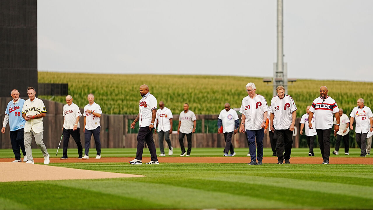 DYERSVILLE, IA - AUGUST 13: Members of the Major League Baseball Hall of Fame enter through the corn prior to the MLB Field of Dreams game between the Philadelphia Phillies and the Minnesota Twins at MLB Field at Field of Dreams on Thursday, August 13, 2026 in Dyersville, Iowa.