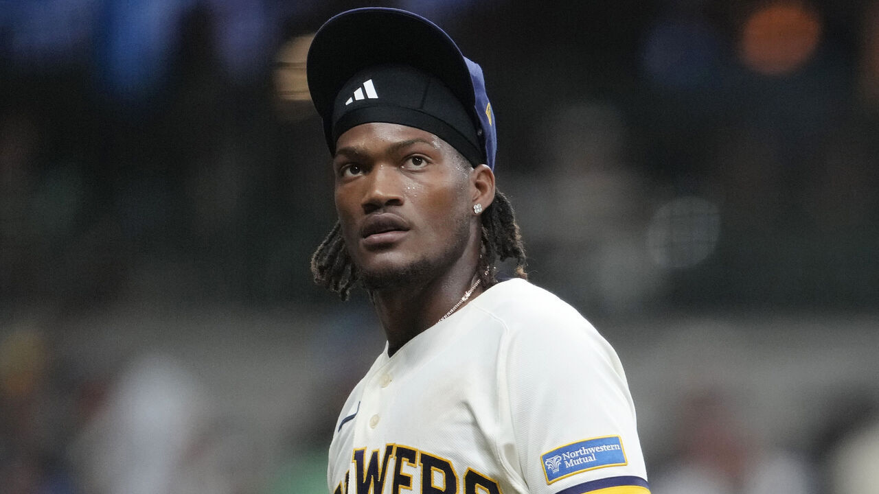 MILWAUKEE, WISCONSIN - AUGUST 04: Abner Uribe #45 of the Milwaukee Brewers celebrates against the Pittsburgh Pirates in the eighth inning at American Family Field on August 04, 2026 in Milwaukee, Wisconsin.