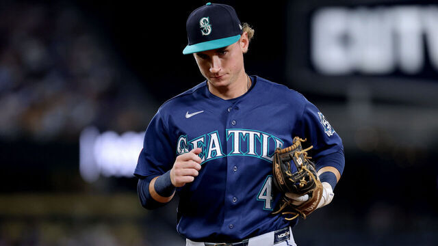 LOS ANGELES, CALIFORNIA - JULY 30: Colt Emerson #4 of the Seattle Mariners jogs to the dugout during the sixth inning against the Los Angeles Dodgers at Dodger Stadium on July 30, 2026 in Los Angeles, California.