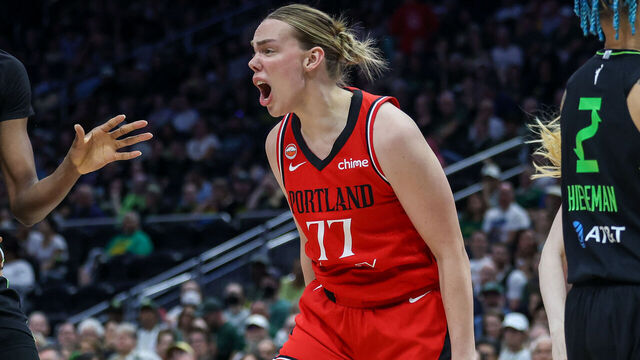 SEATTLE, WASHINGTON - AUGUST 14: Holly Winterburn #77 of the Portland Fire reacts during the first quarter against the Seattle Storm at Climate Pledge Arena on August 14, 2026 in Seattle, Washington.