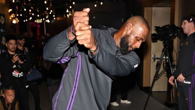 LOS ANGELES, CA - NOVEMBER 18: LeBron James #23 of the Los Angeles Lakers performs a mock golf swing before the game against the Utah Jazz on November 18, 2025 at Crypto.Com Arena in Los Angeles, California. NOTE TO USER: User expressly acknowledges and agrees that, by downloading and/or using this Photograph, user is consenting to the terms and conditions of the Getty Images License Agreement. Mandatory Copyright Notice: Copyright 2025 NBAE