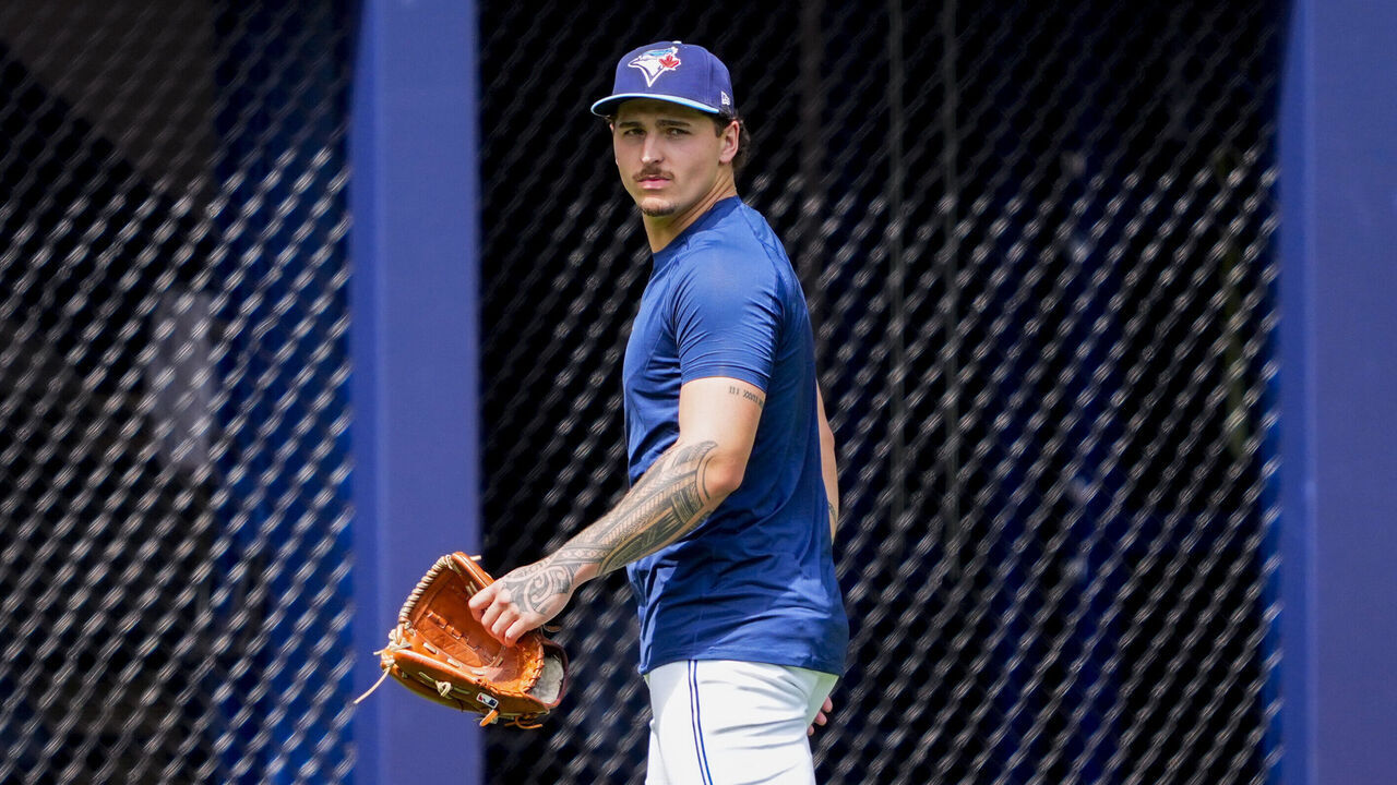 TORONTO, CANADA - AUGUST 15: Ricky Tiedemann #33 of the Toronto Blue Jays walks on the field after being called up from Triple-A ahead of an MLB game against the New York Yankees at the Rogers Centre on August 15, 2026 in Toronto, Ontario, Canada.