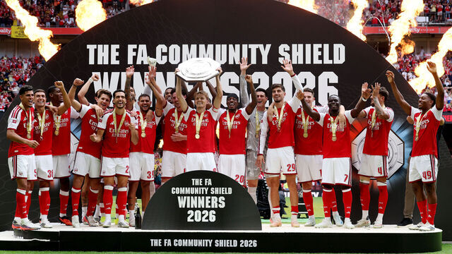 CARDIFF, WALES - AUGUST 16: Martin Odegaard of Arsenal lifts the FA Community Shield trophy with teammates after the 2026 FA Community Shield match between Arsenal and Manchester City at Principality Stadium on August 16, 2026 in Cardiff, Wales.