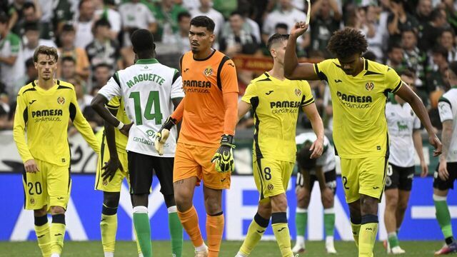 Villarreal's Portuguese defender #12 Renato Veiga (R) reacts at the end of the Spanish league football match between Racing Santander and Villarreal in El Sardinero stadium in Santander on August 16, 2026. The match ended in a draw 2-2.