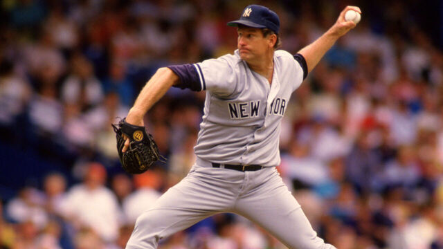 DETROIT - 1987: Tommy John of the New York Yankees pitches during an MLB game against the Detroit Tigers at Tiger Stadium in Detroit, Michigan during the 1987 season.