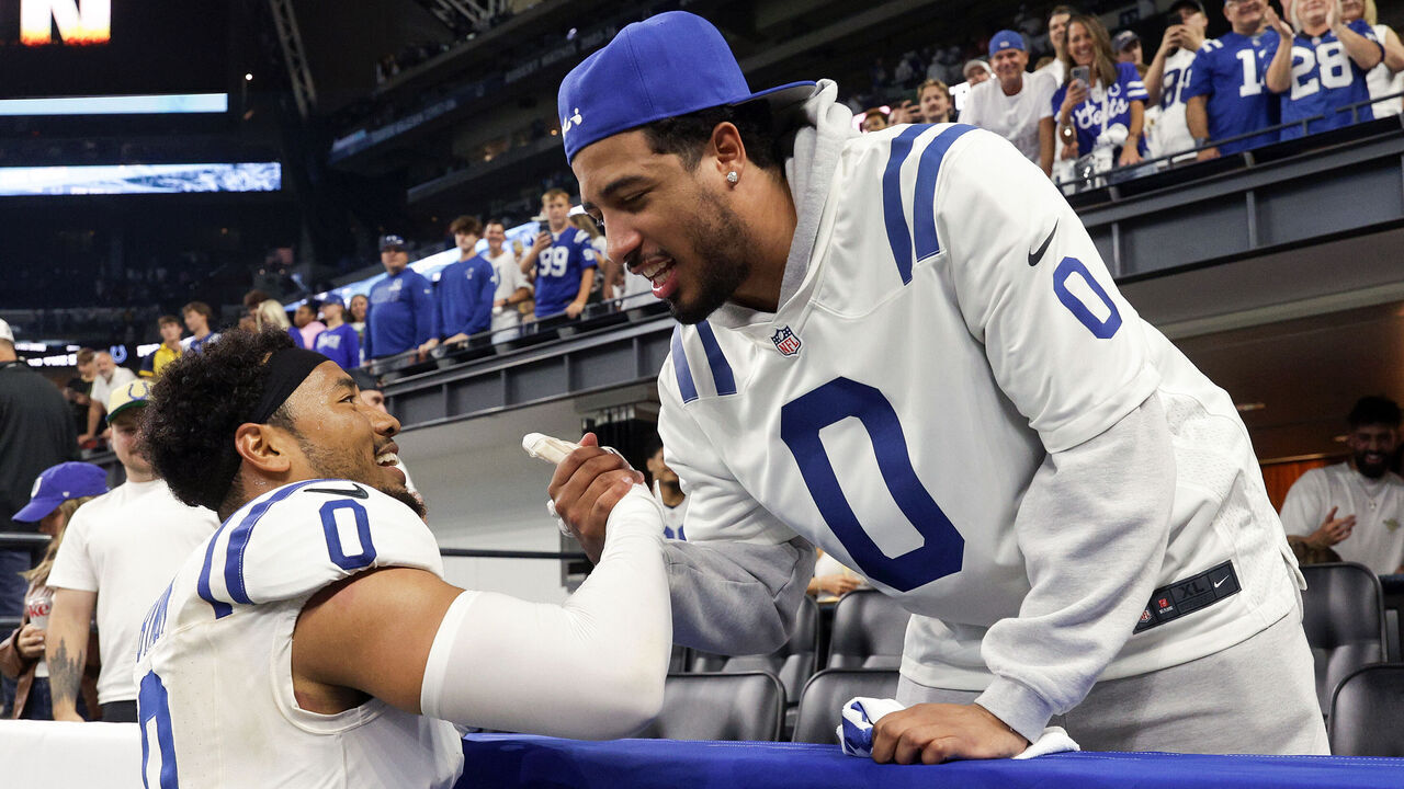 INDIANAPOLIS, INDIANA - SEPTEMBER 14: Cam Bynum #0 of the Indianapolis Colts celebrates with Tyrese Haliburton of the Indiana Pacers after the game against the Denver Broncos at Lucas Oil Stadium on September 14, 2025 in Indianapolis, Indiana. The Indianapolis Colts beat the Denver Broncos 29-28.