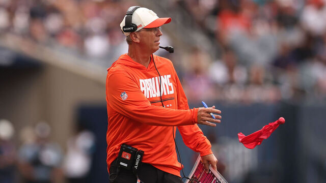 CHICAGO, ILLINOIS - AUGUST 15: Head coach Todd Monken of the Cleveland Browns throws the red flag to challenge a play during the second half of the preseason game against the Chicago Bears at Soldier Field on August 15, 2026 in Chicago, Illinois.