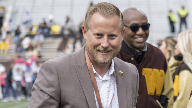 KALAMAZOO, MI - OCTOBER 08: Western Michigan Broncos athletic director Dan Bartholomae exits the field after congratulating student athletes for receiving their varsity jackets during the college football game between the Eastern Michigan Eagles and Western Michigan Broncos on October 08, 2022, at Waldo Stadium in Kalamazoo, MI.