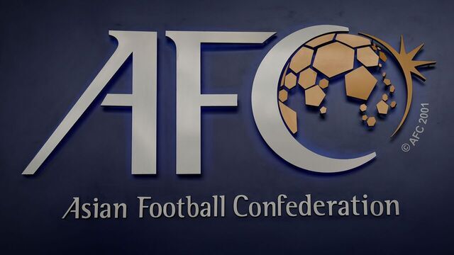 The Asian Football Confederation (AFC) logo is displayed at the AFC headquarters in Kuala Lumpur on March 15, 2017. The upcoming AFC Asian Cup qualifier match between Malaysia and North Korea scheduled for June 8 will take place as planned, the AFC general secretary said on March 15, saying that it is North Korea's responsibility to recommend a neutral venue if diplomatic relations do not thaw. / AFP PHOTO / LILLIAN SUWANRUMPHA