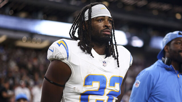 LAS VEGAS, NEVADA - SEPTEMBER 15: Najee Harris #22 of the Los Angeles Chargers stands on the sideline during the national anthem prior to an NFL football game against the Las Vegas Raiders at Allegiant Stadium on September 15, 2025 in Las Vegas, Nevada.