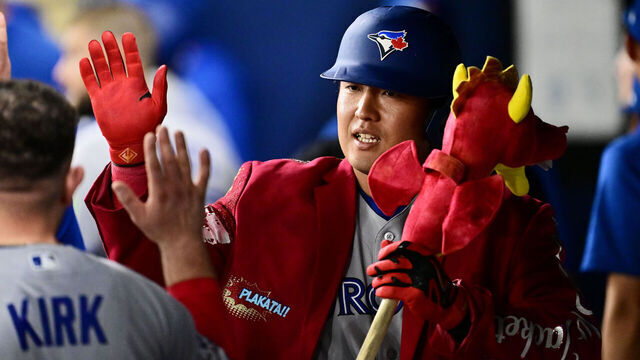 ST PETERSBURG, FLORIDA - AUGUST 18: Kazuma Okamoto #7 of the Toronto Blue Jays celebrates with teammates in the dugout after hitting a home run in the fifth inning against the Tampa Bay Rays at Tropicana Field on August 18, 2026 in St Petersburg, Florida.