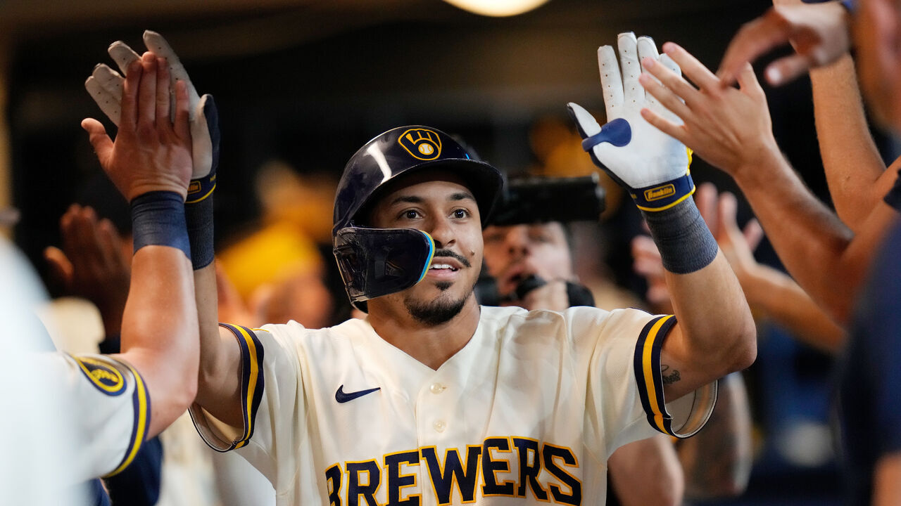 MILWAUKEE, WISCONSIN - AUGUST 18: David Hamilton #6 of the Milwaukee Brewers is congratulated after hitting a three run homer in the sixth inning against the Seattle Mariners at American Family Field on August 18, 2026 in Milwaukee, Wisconsin.