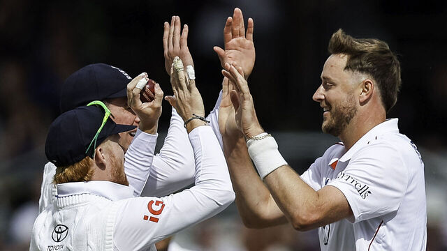 Ollie Robinson of England (no cap) is congratulated for taking the wicket of Shan Masood of Pakistan (not pictured) during Day 1 of the First Rothesay Test match between England and Pakistan at Headingley Stadium in Leeds, United Kingdom, on August 19, 2026.