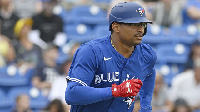 DUNEDIN, FLORIDA - MARCH 20, 2025: Christian Bethancourt #60 of the Toronto Blue Jays runs out a pop fly ball during the eighth inning of a spring training game against the Tampa Bay Rays at TD Ballpark on March 20, 2025 in Dunedin, Florida.