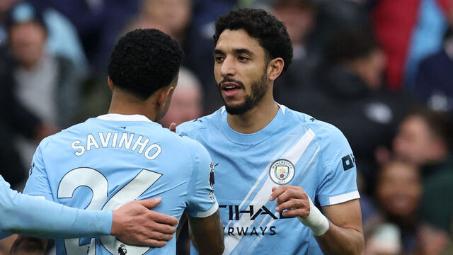 Manchester City's Egyptian striker #07 Omar Marmoush (R) celebrates with Manchester City's Norwegian striker #09 Erling Haaland (L) and Manchester City's Brazilian midfielder #26 Savinho (C) after scoring their third goal during the English Premier League football match between Manchester City and Brentford at the Etihad Stadium in Manchester, north west England, on May 9, 2026. / RESTRICTED TO EDITORIAL USE. No use with unauthorized audio, video, data, fixture lists, club/league logos or 'live' services. Online in-match use limited to 120 images. An additional 40 images may be used in extra time. No video emulation. Social media in-match use limited to 120 images. An additional 40 images may be used in extra time. No use in betting publications, games or single club/league/player publications. /