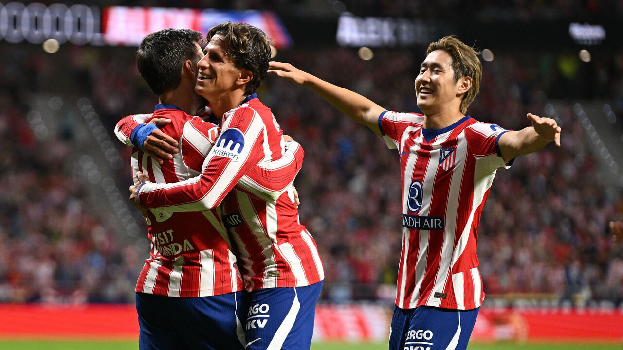MADRID, SPAIN - AUGUST 19: Kang-in Lee (R) of Atletico Madridcelebrates with teammates Alex Baena (unseen) and Giuliano Simeone after Baena scored their team's second goal during the LaLiga EA Sports 2026/27 match between Atletico de Madrid and Malaga CF at Riyadh Air Metropolitano on August 19, 2026 in Madrid, Spain.