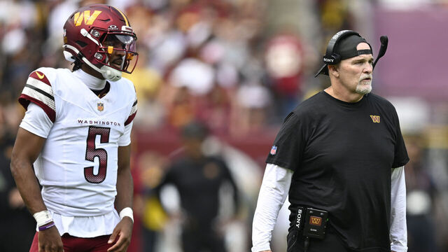 LANDOVER, MD - SEPTEMBER 7: Washington Commanders quarterback Jayden Daniels, left, with head Coach Dan Quinn during a game against the New York Giants at the Northwest Stadium in Landover, MD on September 7, 2025.