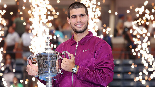 NEW YORK, NEW YORK - SEPTEMBER 07: Carlos Alcaraz of Spain poses with his trophy after defeating Jannik Sinner of Italy during their Men's Singles Final match on Day Fifteen of the 2025 US Open at USTA Billie Jean King National Tennis Center on September 07, 2025 in New York City.