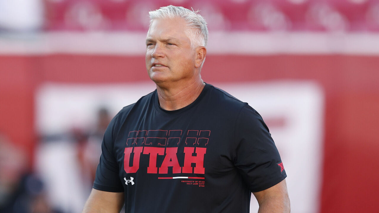 SALT LAKE CITY, UT - AUGUST 29: Freddie Whittingham tight ends coach of the Utah Utes walks on the field during warmups before their game against the Southern Utah Thunderbirds at Rice Eccles Stadium on August 29, 2024 in Salt Lake City, Utah.