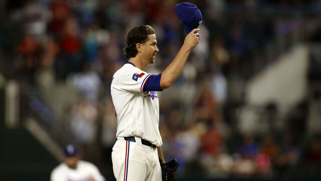 ARLINGTON, TEXAS - AUGUST 20: Jacob deGrom #48 of the Texas Rangers acknowledges fans following career strikeout number 2000 against the Washington Nationals during the first inning at Globe Life Field on August 20, 2026 in Arlington, Texas.