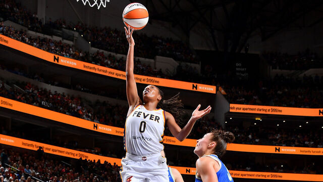ARLINGTON, TX - AUGUST 20: Kelsey Mitchell #0 of the Indiana Fever drives to the basket during the game against the Dallas Wings on August 20, 2026 at the College Park Center in Arlington, TX. Mandatory Copyright Notice: Copyright 2026 NBAE