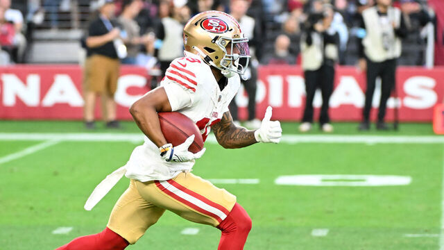 GLENDALE, ARIZONA - JANUARY 05: Jacob Cowing #19 of the San Francisco 49ers runs with the ball against the Arizona Cardinals at State Farm Stadium on January 05, 2025 in Glendale, Arizona.