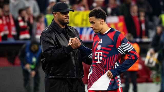 MUNICH, GERMANY - MAY 06: Vincent Kompany of FC Bayern Muenchen sheke hands with Jamal Musiala after his Team were knocked out of the UEFA Champions League 2025/26 Semi Final Second Leg match between FC Bayern München and Paris Saint-Germain at Football Arena Munich on May 06, 2026 in Munich, Germany.