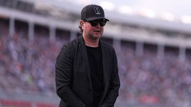 CONCORD, NORTH CAROLINA - MAY 24: NASCAR Hall of Famer Kurt Busch stands during the remembrance ceremony for his brother, Kyle Busch, who passed away suddenly at the age of 41, prior to the NASCAR Cup Series Coca-Cola 600 at Charlotte Motor Speedway on May 24, 2026 in Concord, North Carolina.