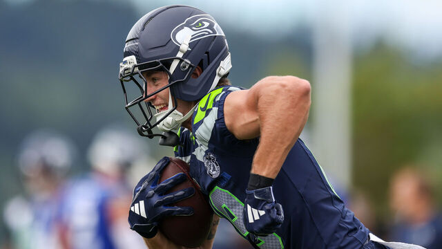 RENTON, WASHINGTON - JULY 25: Jake Bobo #19 of the Seattle Seahawks runs with the ball during practice at Virginia Mason Athletic Center on July 25, 2026 in Renton, Washington.