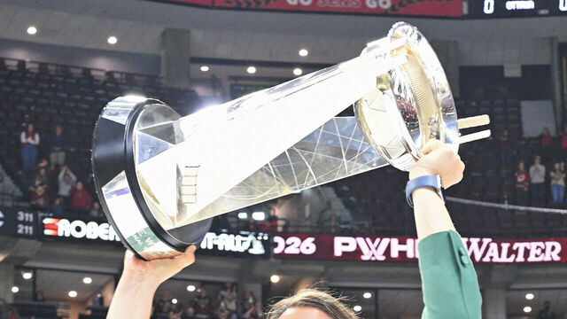 OTTAWA, ONTARIO - MAY 20: Kori Cheverie Head coach of the Montreal Victoire lifts The Walter Cup after the Montreal Victoire won the Walter Cup by defeating the Ottawa Charge in Game 4 of the PWHL Walter Cup Final at Canadian Tire Centre on May 20, 2026 in Ottawa, Ontario.