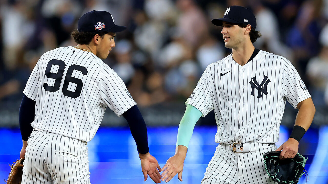 NEW YORK, NEW YORK - AUGUST 21: George Lombard Jr. #96 and Spencer Jones #78 of the New York Yankees celebrate the win over the Toronto Blue Jays at Yankee Stadium on August 21, 2026 in the Bronx borough of New York City. The New York Yankees defeated the Toronto Blue Jays 3-1.