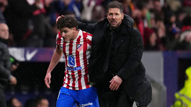 MADRID, SPAIN - FEBRUARY 12: Diego Simeone, Head Coach of Atletico de Madrid, interacts with Julian Alvarez after being substituted off during the Copa Del Rey Semi-Final First Leg match between Atletico de Madrid and FC Barcelona at Riyadh Air Metropolitano on February 12, 2026 in Madrid, Spain.