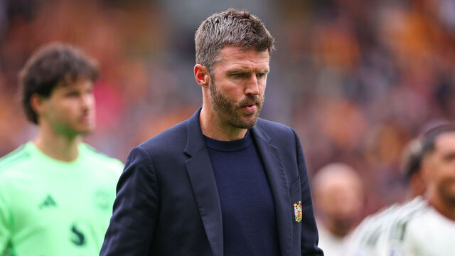 HULL, ENGLAND - AUGUST 22: A dejected Manchester United head coach / manager Michael Carrick walks off at full time during the Premier League 2026/27 match between Hull City and Manchester United at MKM Stadium on August 22, 2026 in Hull, United Kingdom.
