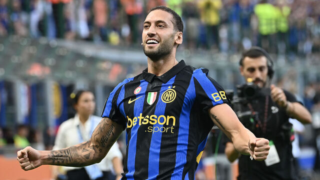MILAN, ITALY, AUGUST 22: Inter Milan's Hakan Calhanoglu celebrates after scores his team's first goal during the Italian serie A football match between Inter Milan and Monza at San Siro Meazza stadium in Milan, Italy, on August 22, 2026.