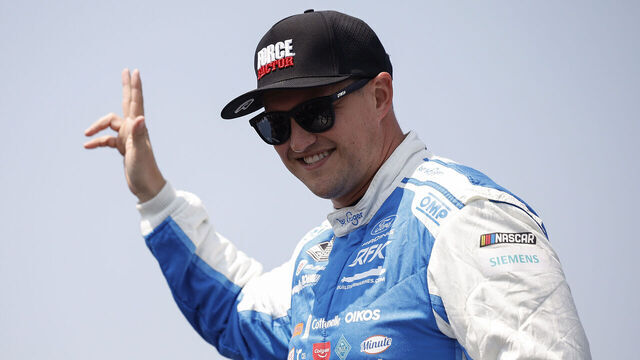 NEWTON, IOWA - AUGUST 09: Ryan Preece, driver of the #60 Kroger/Force Factor Ford, waves to fans as he walks onstage during driver intros prior to the NASCAR Cup Series Iowa Corn 350 Powered by Ethanol at Iowa Speedway on August 09, 2026 in Newton, Iowa.