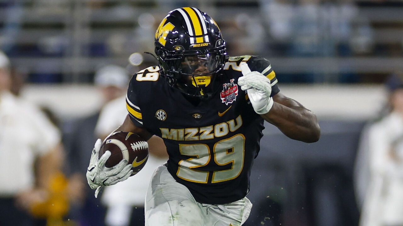 JACKSONVILLE, FL - DECEMBER 27: Missouri Tigers running back Ahmad Hardy (29) runs with the ball during the TaxSlayer Gator Bowl game between the Missouri Tigers and the Virginia Cavaliers on December 27, 2025 at EverBank Field in Jacksonville, Fl.